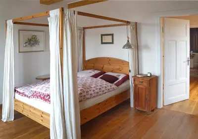 Ein Bett oder Betten in einem Zimmer der Unterkunft Gästehaus Kibbel