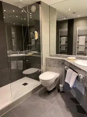 Ein Badezimmer in der Unterkunft Country Hotel Timmendorfer Strand