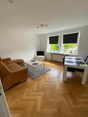 Ein Sitzbereich in der Unterkunft 3 Zimmer Wohnung für 4 Personen