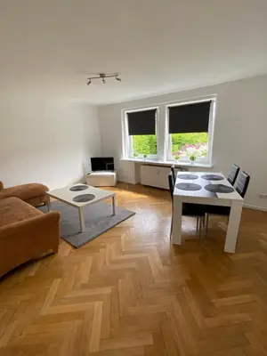 Ein Sitzbereich in der Unterkunft 3 Zimmer Wohnung für 4 Personen