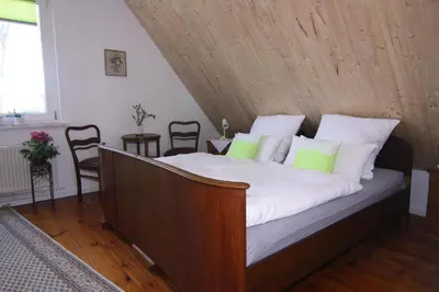 Ein Bett oder Betten in einem Zimmer der Unterkunft Gemütliche Ferienwohnung in Mallentin