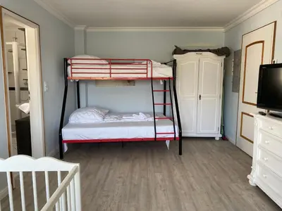 Ein Bett oder Betten in einem Zimmer der Unterkunft Casa Raphael direkt am Scharbeutzer Strand