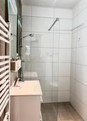 Ein Badezimmer in der Unterkunft Seaside Lodge Süsel, Lübecker Bucht, Ostsee