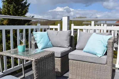 Ein Balkon oder eine Terrasse in der Unterkunft Ferienwohnung Kleine Strandkoje