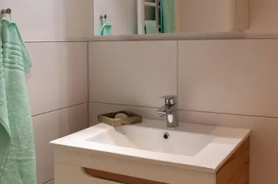 Ein Badezimmer in der Unterkunft Ferienwohnung Kleine Strandkoje