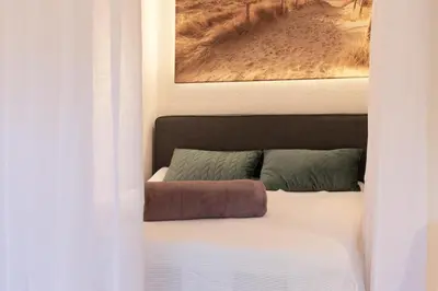 Ein Bett oder Betten in einem Zimmer der Unterkunft Ferienwohnung Ocean Lodge Timmendorfer Strand