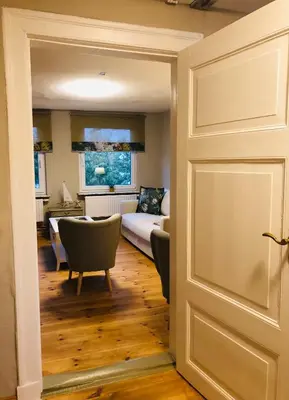 Ein Bett oder Betten in einem Zimmer der Unterkunft Ferienwohnung C im Ferienhaus Antika
