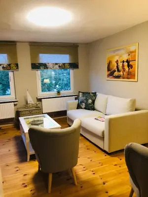 Ein Sitzbereich in der Unterkunft Ferienwohnung C im Ferienhaus Antika
