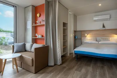 Ein Bett oder Betten in einem Zimmer der Unterkunft Düne 46
