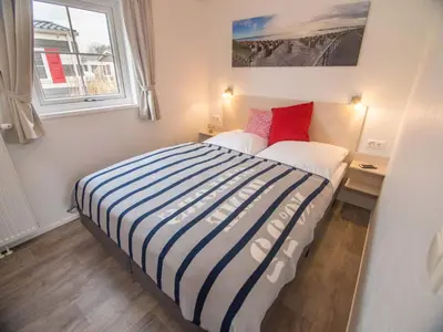 Ein Bett oder Betten in einem Zimmer der Unterkunft Pier98 20
