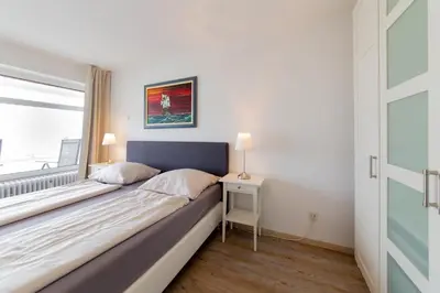 Ein Bett oder Betten in einem Zimmer der Unterkunft Ferienwohnung Muschelsucher