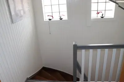 Ein Bett oder Betten in einem Zimmer der Unterkunft Ferienwohnung zum weißen Schwan