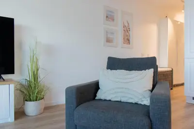 Ein Sitzbereich in der Unterkunft Ferienwohnung 54 Grad Nord - Haffkrug
