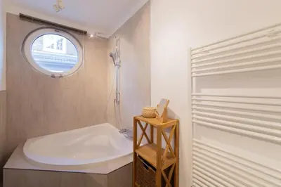 Ein Bett oder Betten in einem Zimmer der Unterkunft Ferienwohnung 54 Grad Nord - Haffkrug
