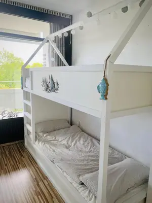 Ein Bett oder Betten in einem Zimmer der Unterkunft PANORAMIC FeWo SEESCHWALBE - Pool - Familien - strandnah - Hunde