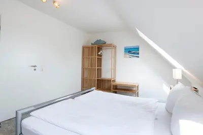 Ein Bett oder Betten in einem Zimmer der Unterkunft Kammerweg 89 Cliff
