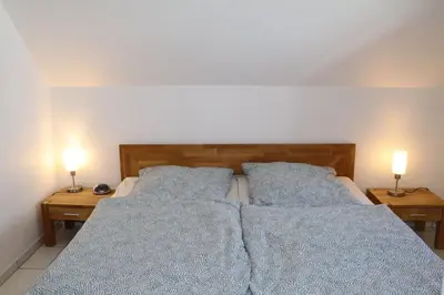 Ein Bett oder Betten in einem Zimmer der Unterkunft Appartement 11