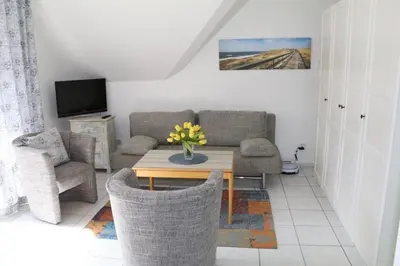 Ein Sitzbereich in der Unterkunft Appartement 12