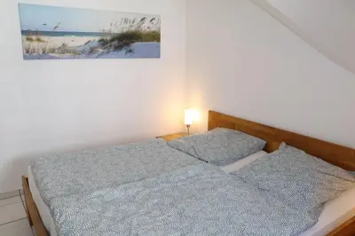 Ein Bett oder Betten in einem Zimmer der Unterkunft Appartement 12