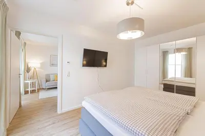 Ein Bett oder Betten in einem Zimmer der Unterkunft Ferienwohnung Aqualino
