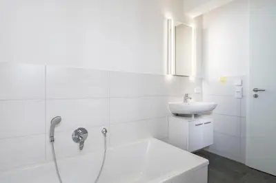 Ein Badezimmer in der Unterkunft Wohnung 2
