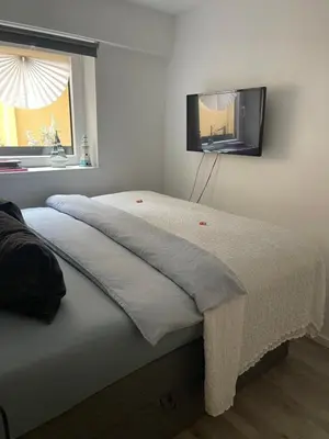 Ein Bett oder Betten in einem Zimmer der Unterkunft Ostsee Ferienwohnung Möwengasse
