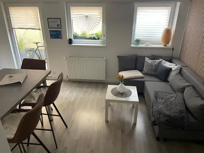 Ein Sitzbereich in der Unterkunft Ostsee Ferienwohnung Möwengasse
