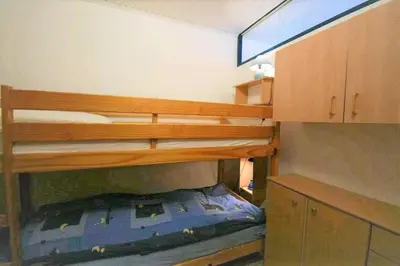 Ein Bett oder Betten in einem Zimmer der Unterkunft Apartementhaus Panoramic