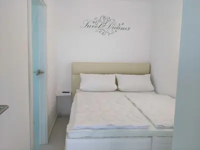Ein Bett oder Betten in einem Zimmer der Unterkunft Ferienpark Haus D