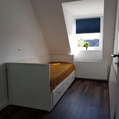 Ein Bett oder Betten in einem Zimmer der Unterkunft Ostseetraum