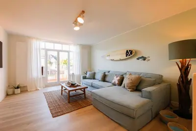 Ein Sitzbereich in der Unterkunft Cooles Ferienhaus HAFF COAST im Surfer-Style in Scharbeutz - Haffkrug