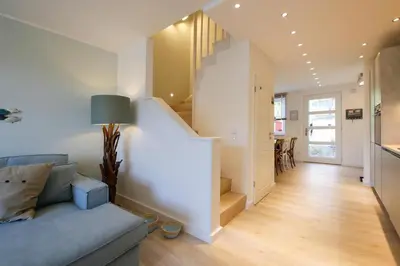 Ein Sitzbereich in der Unterkunft Cooles Ferienhaus HAFF COAST im Surfer-Style in Scharbeutz - Haffkrug