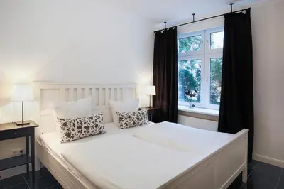 Ein Bett oder Betten in einem Zimmer der Unterkunft Villa An Der See