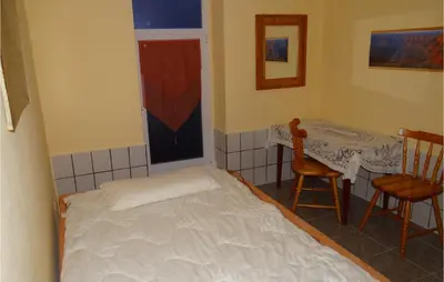 Ein Bett oder Betten in einem Zimmer der Unterkunft 1 Bedroom Lovely Apartment In Schönberg