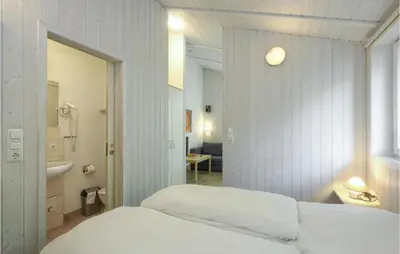 Ein Bett oder Betten in einem Zimmer der Unterkunft Schmugglerstieg 11C - Dorf 5