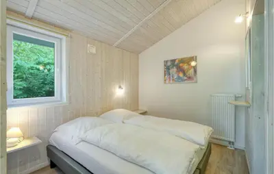 Ein Bett oder Betten in einem Zimmer der Unterkunft Schmugglerstieg 13A - Dorf 5