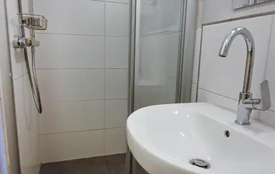 Ein Badezimmer in der Unterkunft Schmugglerstieg 13C - Dorf 5