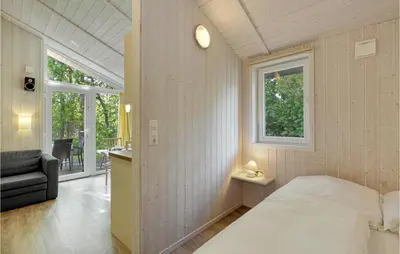 Ein Bett oder Betten in einem Zimmer der Unterkunft Schmugglerstieg 9C - Dorf 5