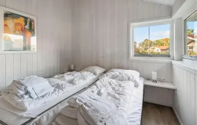 Ein Bett oder Betten in einem Zimmer der Unterkunft Schmugglerstieg 7 - Dorf 6