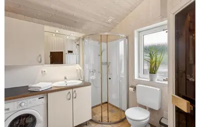 Ein Badezimmer in der Unterkunft Dünenpark 2D - Dorf 4
