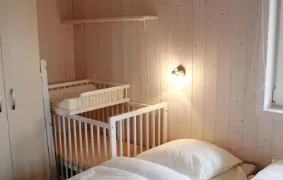 Ein Bett oder Betten in einem Zimmer der Unterkunft Freibeuterweg 9 - Dorf 5