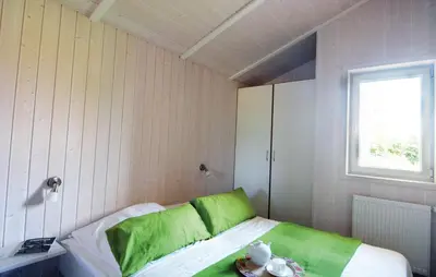 Ein Bett oder Betten in einem Zimmer der Unterkunft Freibeuterweg 8 - Dorf 6
