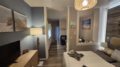 TV/Unterhaltungsangebot in der Unterkunft Strandallee Ferienwohnung