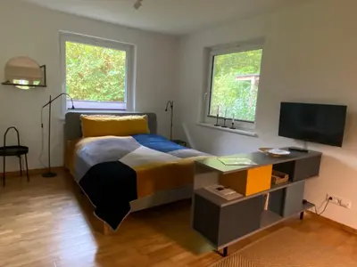 Ein Bett oder Betten in einem Zimmer der Unterkunft Saunahäuschen