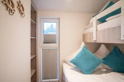 Ein Bett oder Betten in einem Zimmer der Unterkunft Ostseecamp Lübecker Bucht Seeigel
