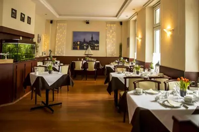 Ein Restaurant oder anderes Speiselokal in der Unterkunft Hotel Hanseatic Lübeck