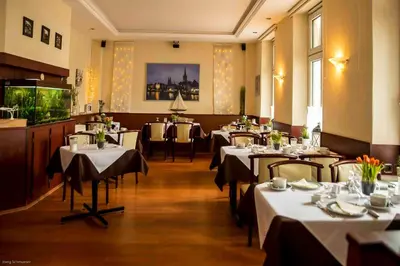 Ein Restaurant oder anderes Speiselokal in der Unterkunft Hotel Hanseatic Lübeck