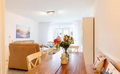 Ein Sitzbereich in der Unterkunft Ferienhaus Lora - Haffkrug
