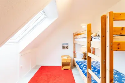Ein Bett oder Betten in einem Zimmer der Unterkunft Ferienhaus Lora - Haffkrug