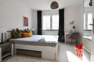 Ein Bett oder Betten in einem Zimmer der Unterkunft Ferienwohnung Strandluft - Niendorf Ostsee